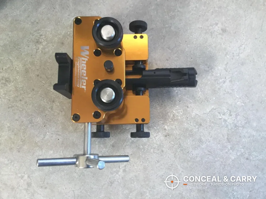 Top view of the Wheeler sight tool with a slide clamped in place