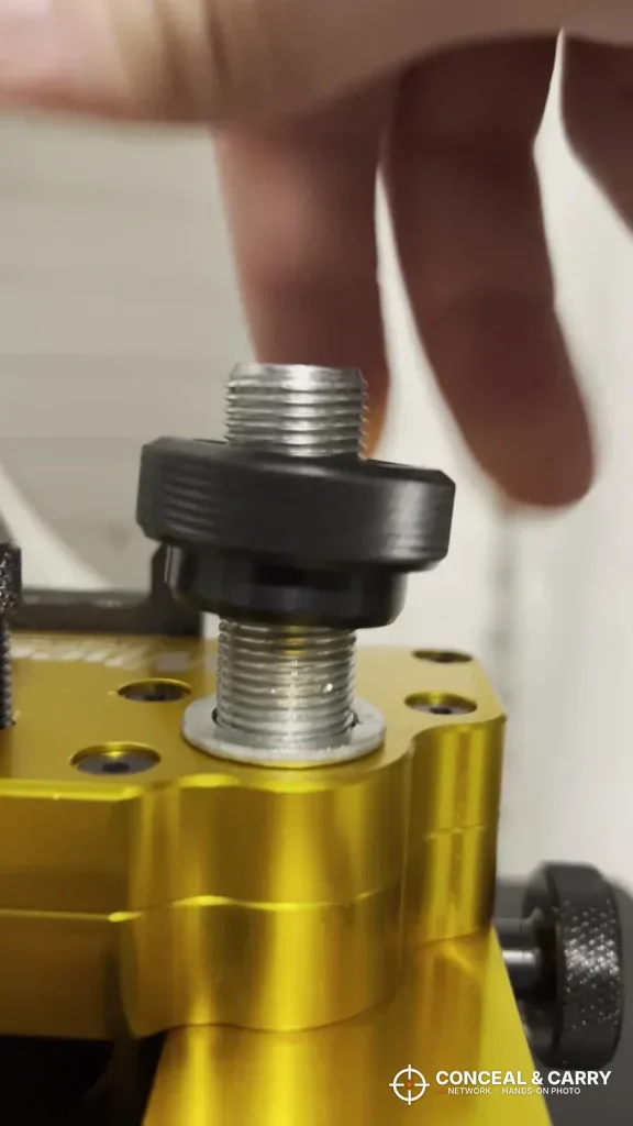 Knurled knob lifted on its threaded post on the Wheeler sight tool