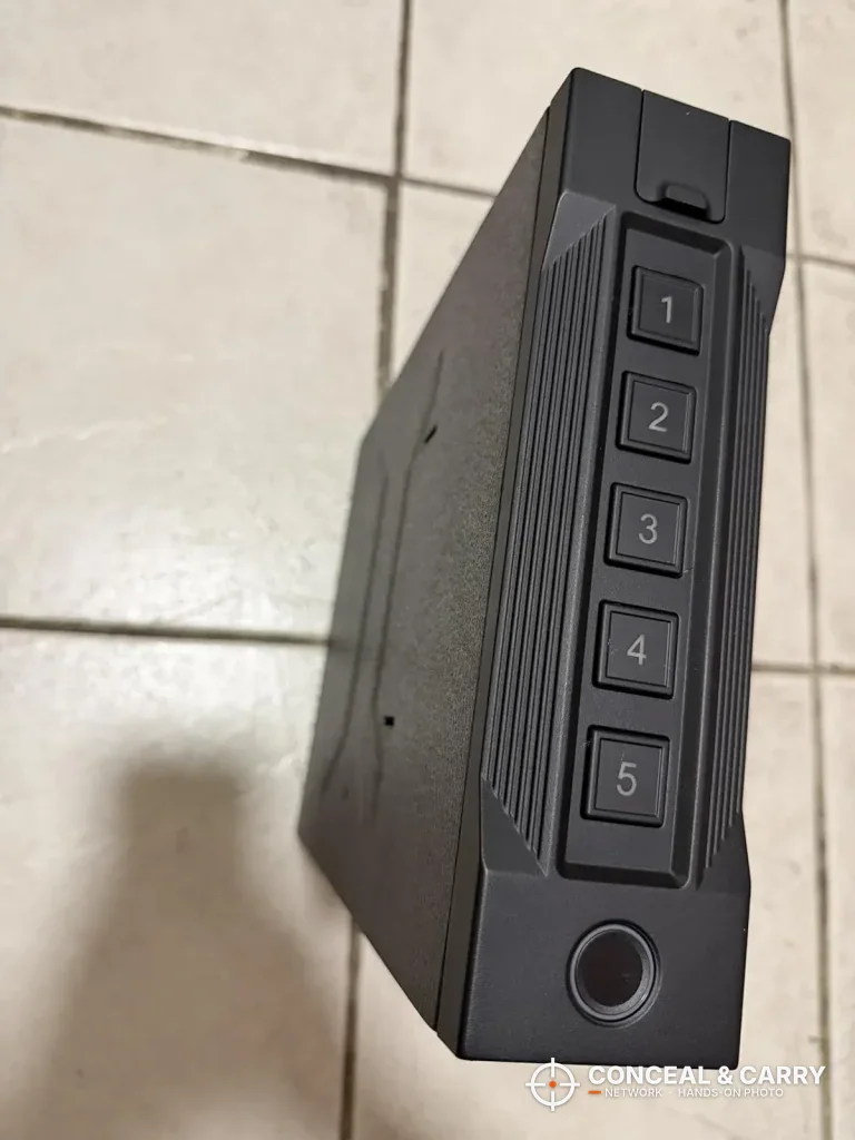 XDeer biometric slider safe standing on its edge with numbered buttons and a fingerprint reader on the narrow face