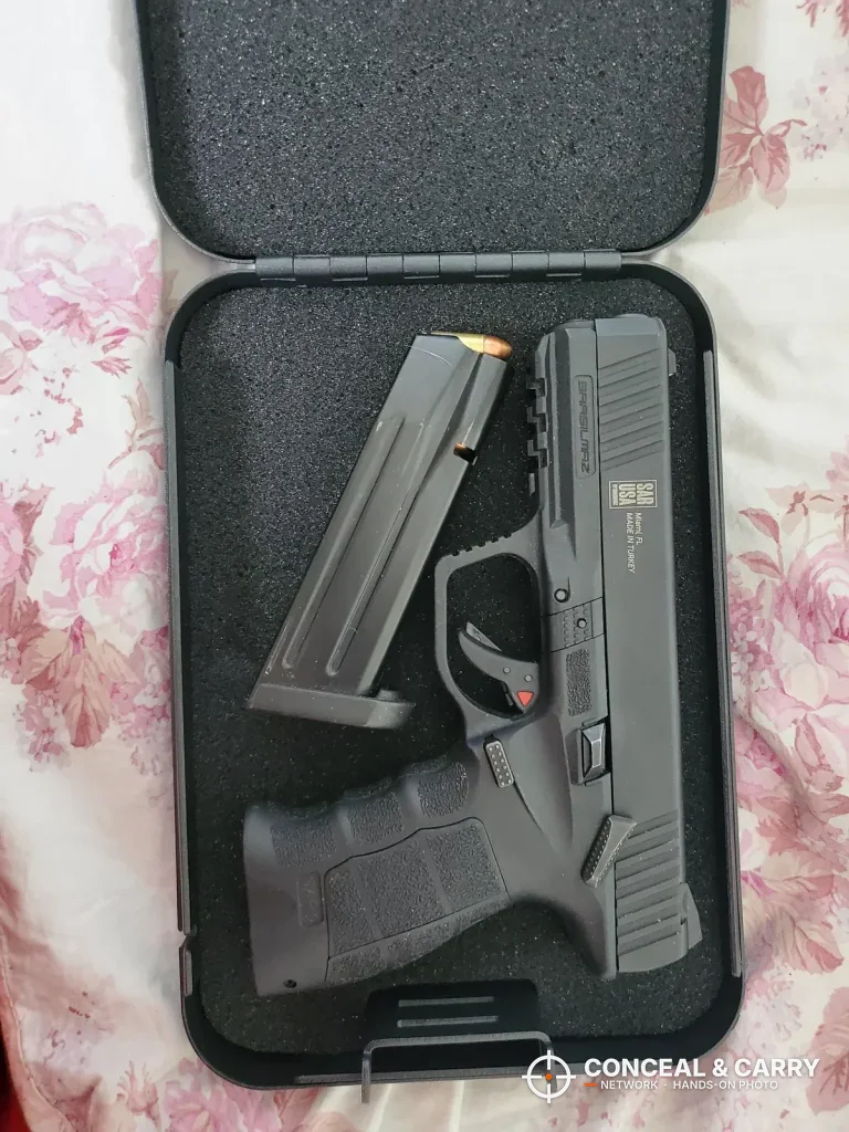Younion pistol safe open with a compact pistol in the foam